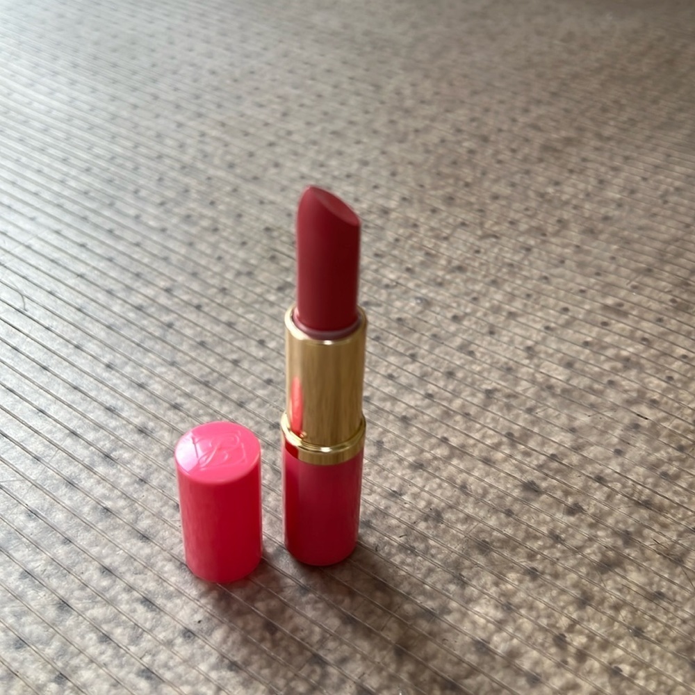 Estée Lauder candy shimmer long lasting lipstick.